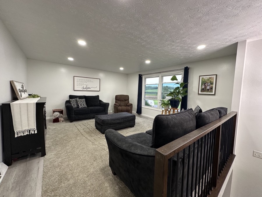 Living room framing the rolling valley views